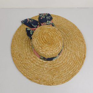 wide brimmed sun hat with flower fabric bow